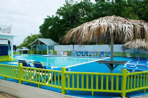 Swim up bar at Fun Holiday Beach Hotel Negril Jamaica